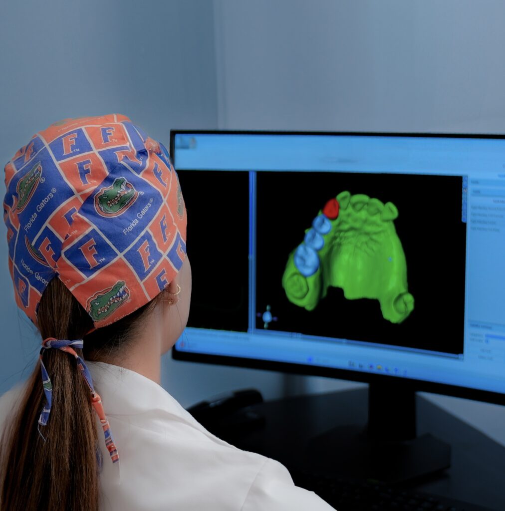 Dr. Quintana viewing a 3D model - Q Smiles Dentistry - Implant & Cosmetic Dentistry in North Miami Beach